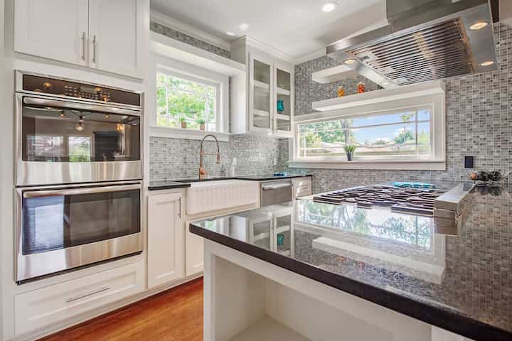 Silver and white upgraded kitchen remodeling appliances in Des Plaines, Illinois home.